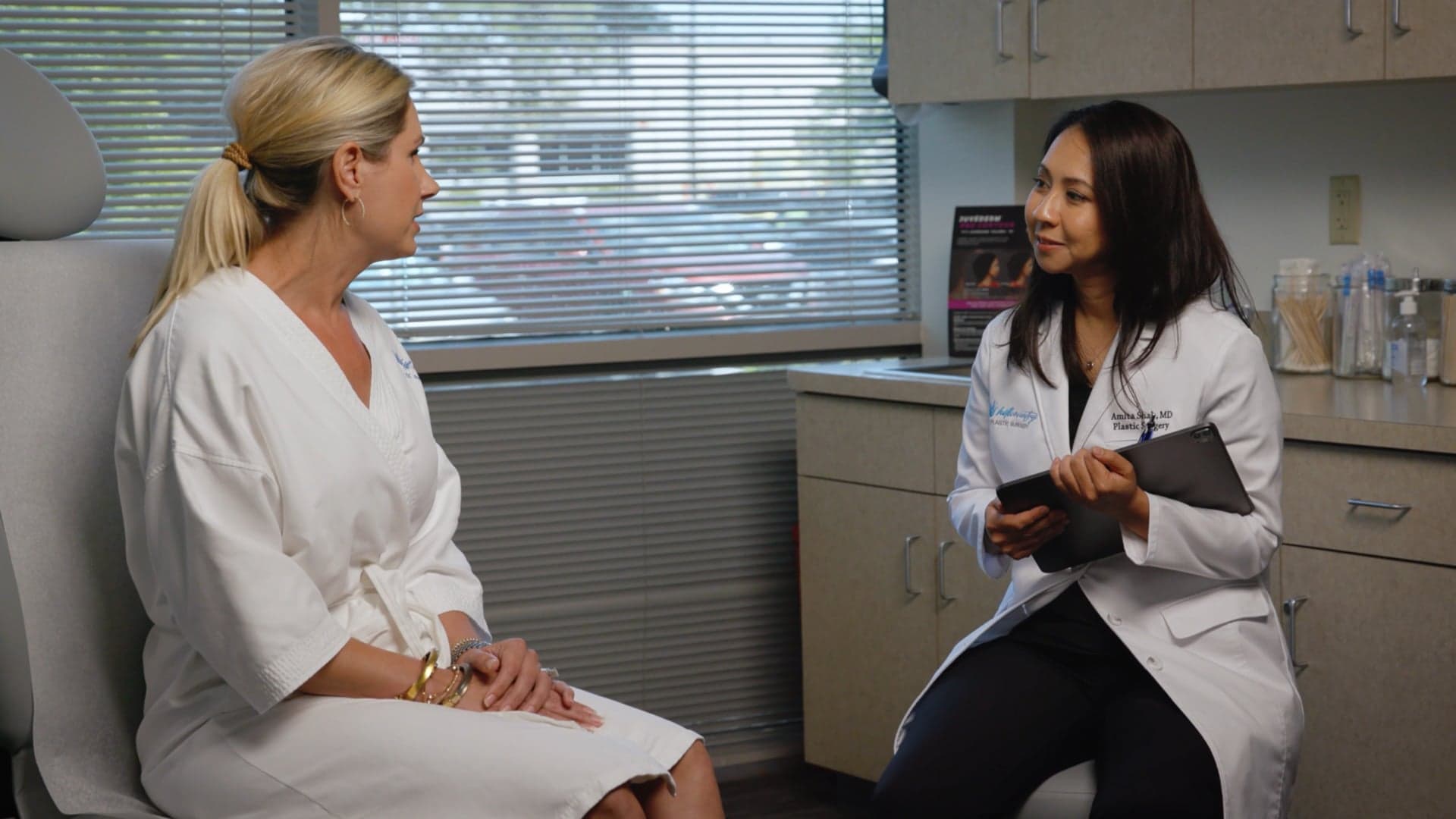 Doctor speaking with a patient in a medical office
