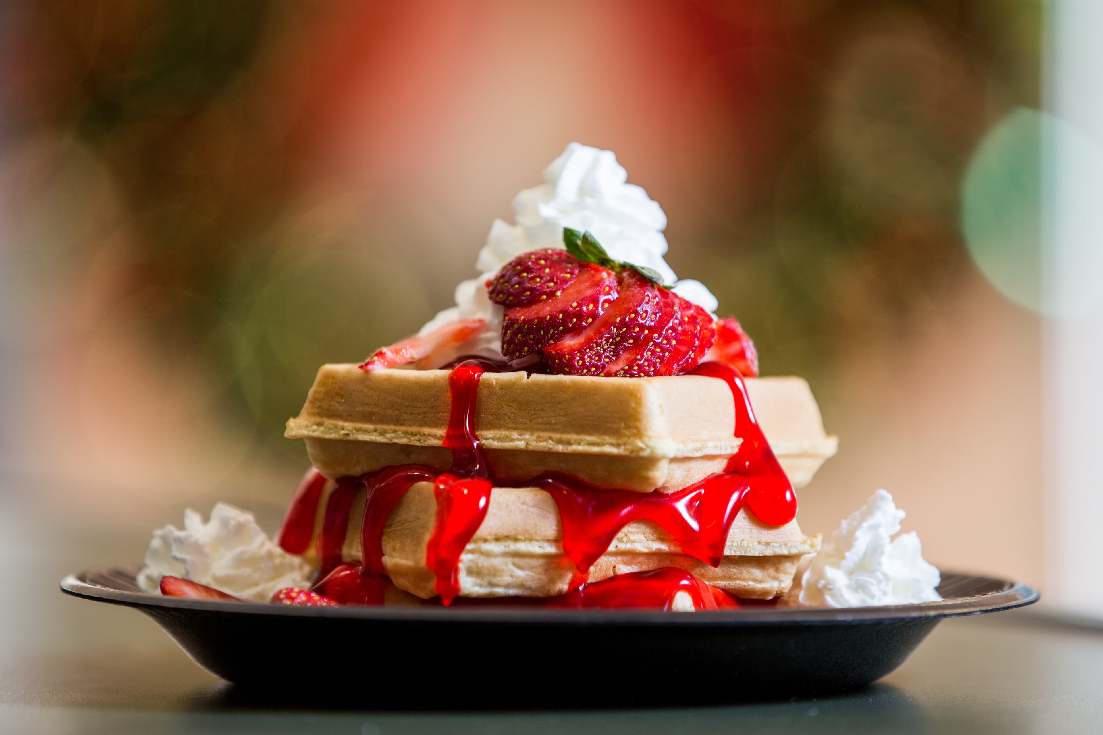 Strawberry waffles with whipped cream - food and dining photography in San Antonio