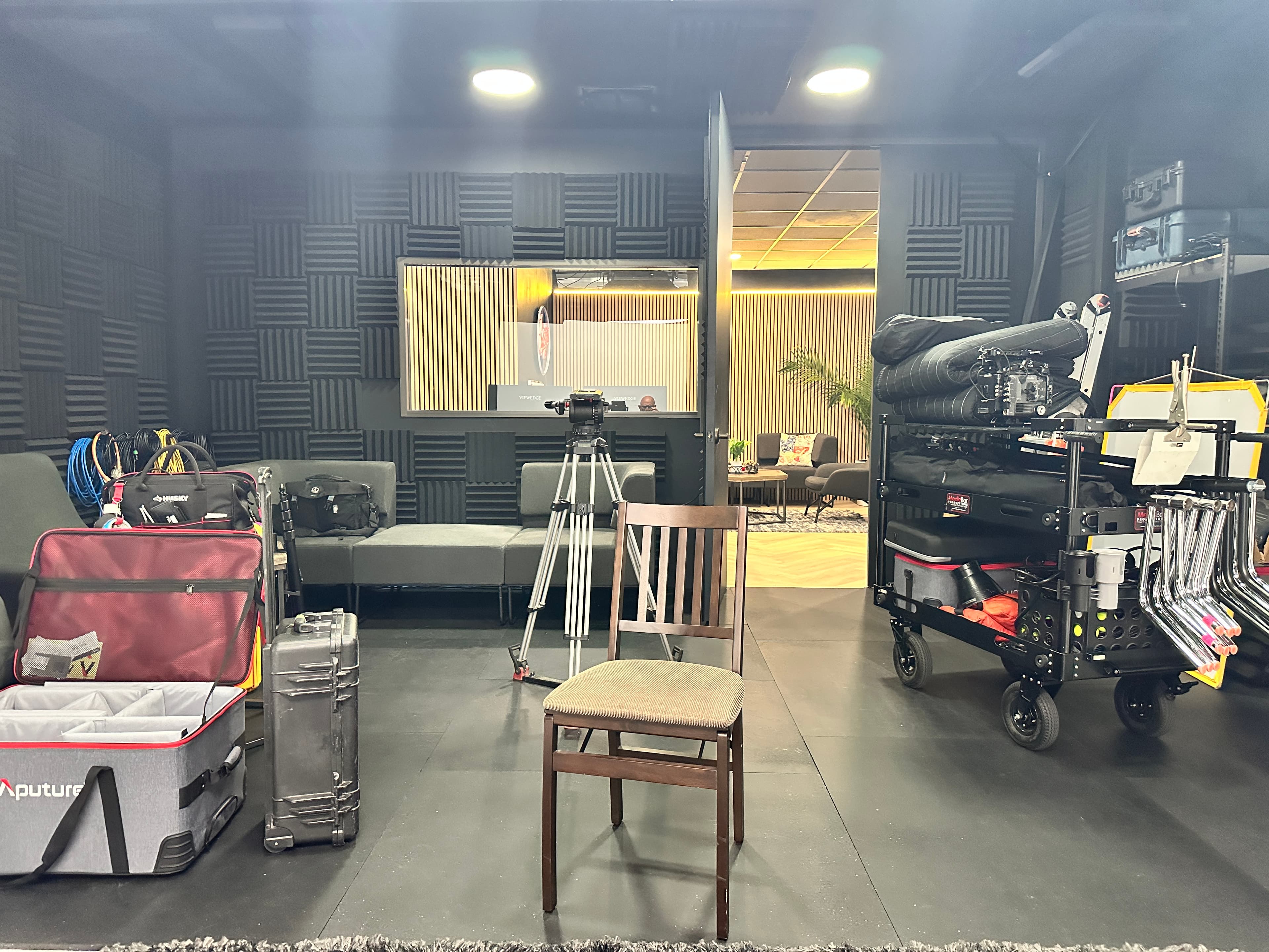 Production support area with camera carts and acoustic treatment at Media Bar Productions
